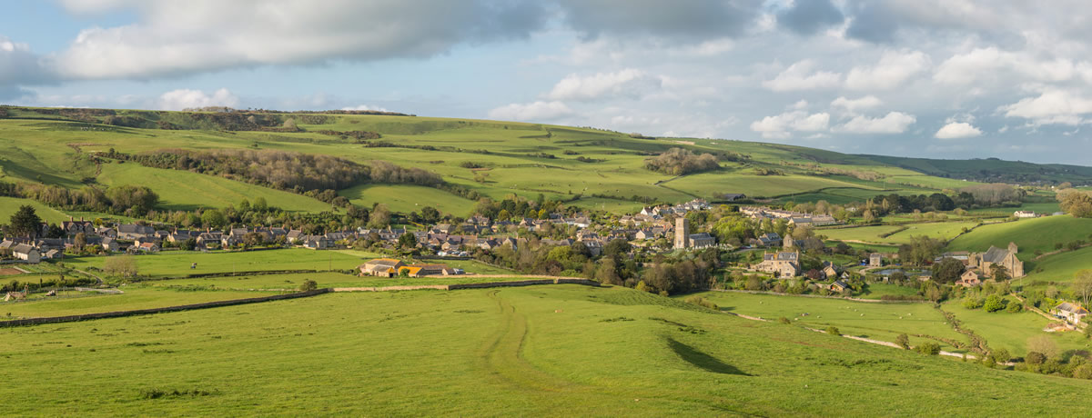 Countryside hills with church in the distance